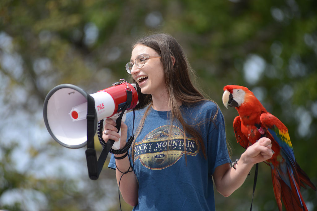 Barb Kuensting speaks about the Amazon burning Friday at the Climate March